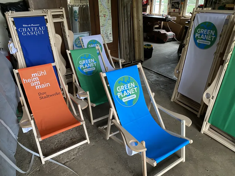 Finished printed deckchairs from a company series in different colours