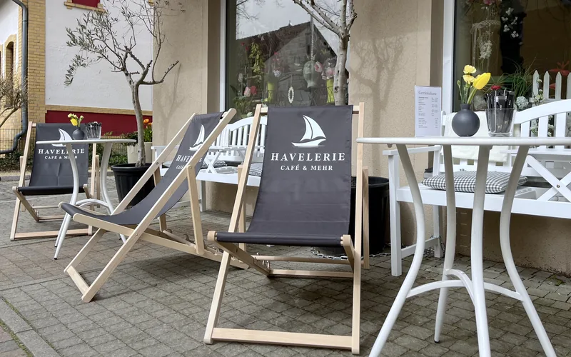 Printed deckchairs on a café terrace outdoors