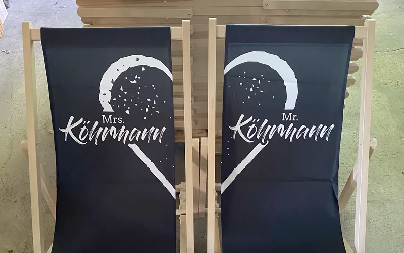 Matching deckchairs for a wedding couple, individually printed