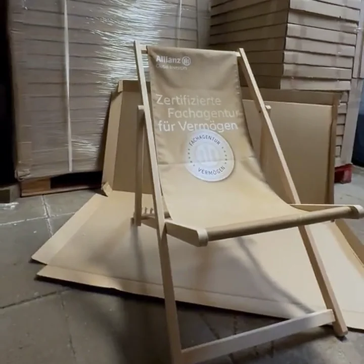 Printed deckchair in front of individually packed employee gifts